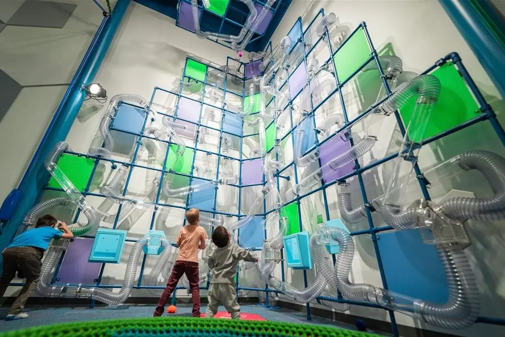 Children exploring a hands-on science and discovery exhibit at Nutrien Wonderhub in Saskatoon.