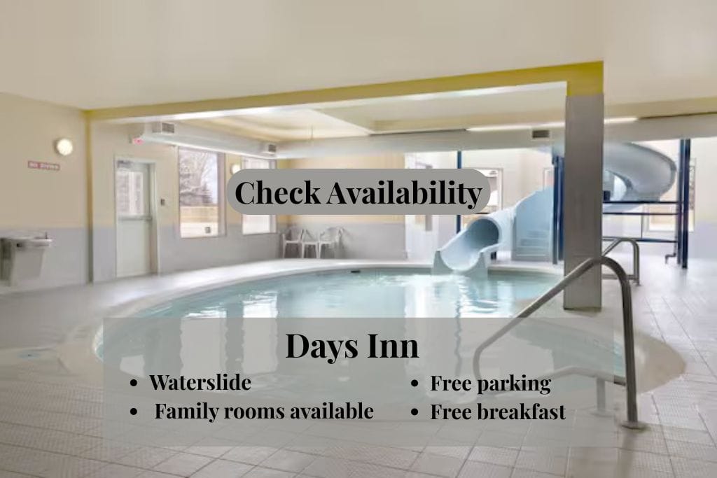 Moose Jaw on a budget Pool and water slide at the Days Inn with text over top telling it's name and features with a button saying check availability, showing places to stay in Moose on a budget