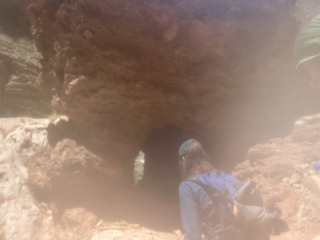 Jaimie walking into a short tunnel just before the Confluence