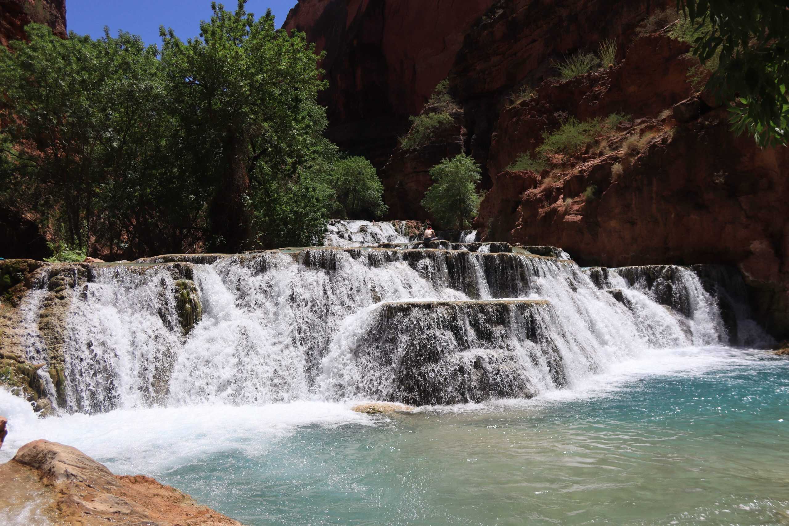 Terraced travertine cascades and turquoise pools at Beaver Falls in Havasupai Canyon.