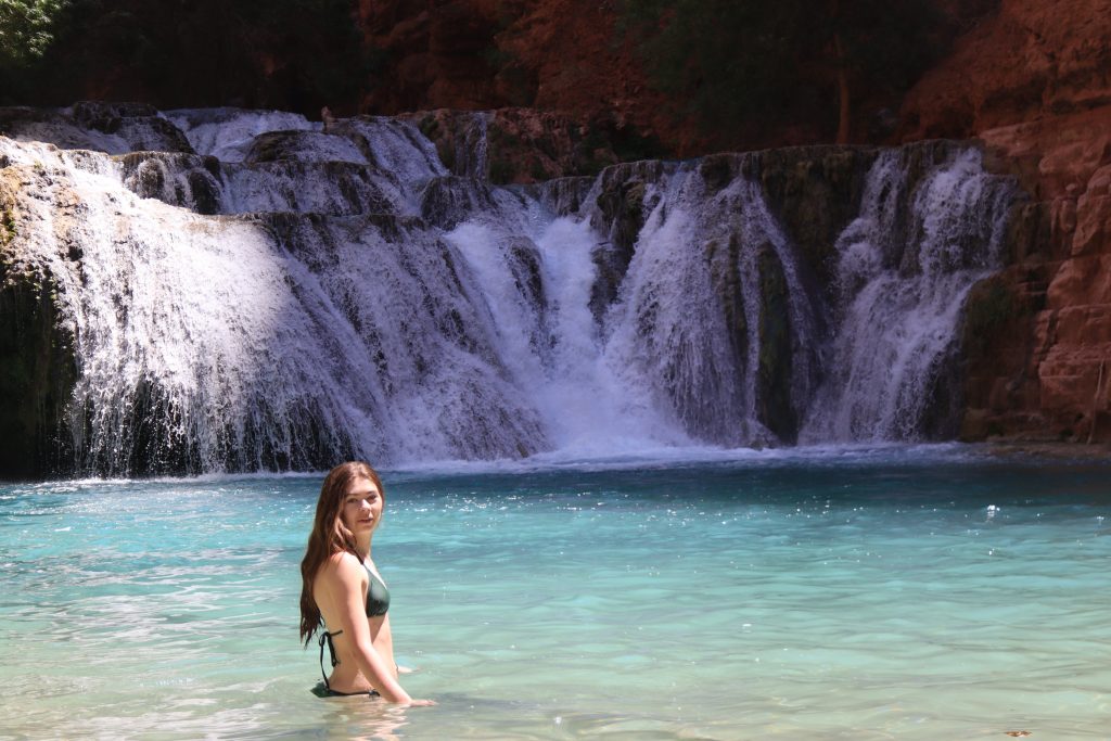 Beaver Falls Sarah in the main pool at Beaver Falls with cascading travertine falls in the background.