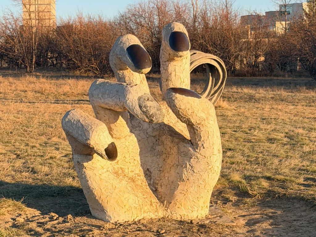 Large hand sculpture in the outdoor sculpture garden at the University of Saskatchewan in Saskatoon