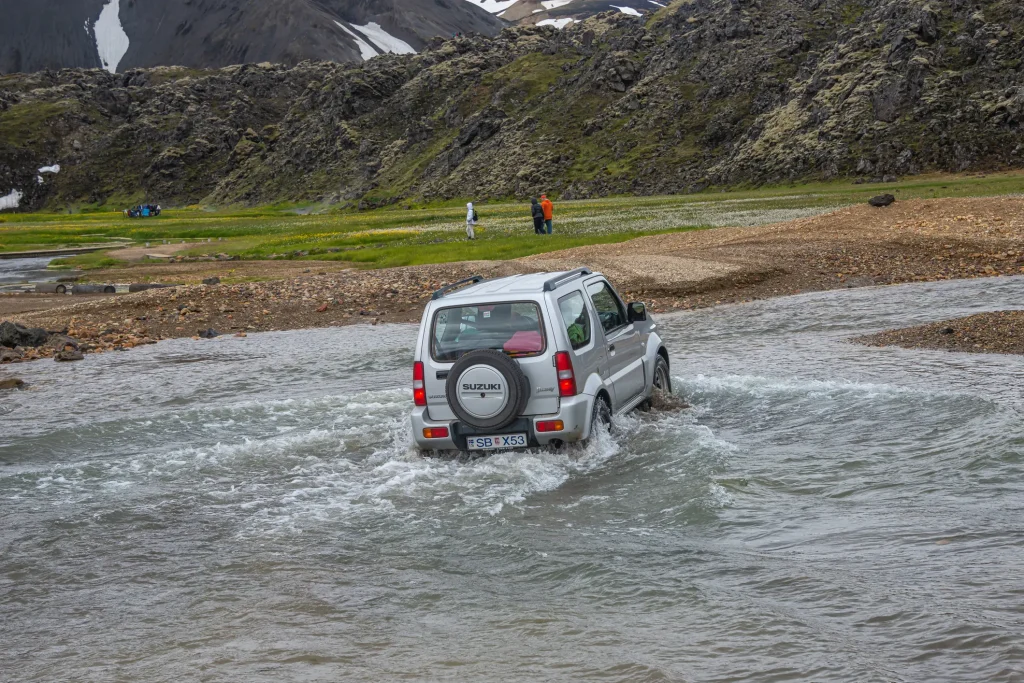 River crossing on the F-road into Landmannalaugar campground, highlighting why 4×4 access is required for transportation to the Laugavegur.