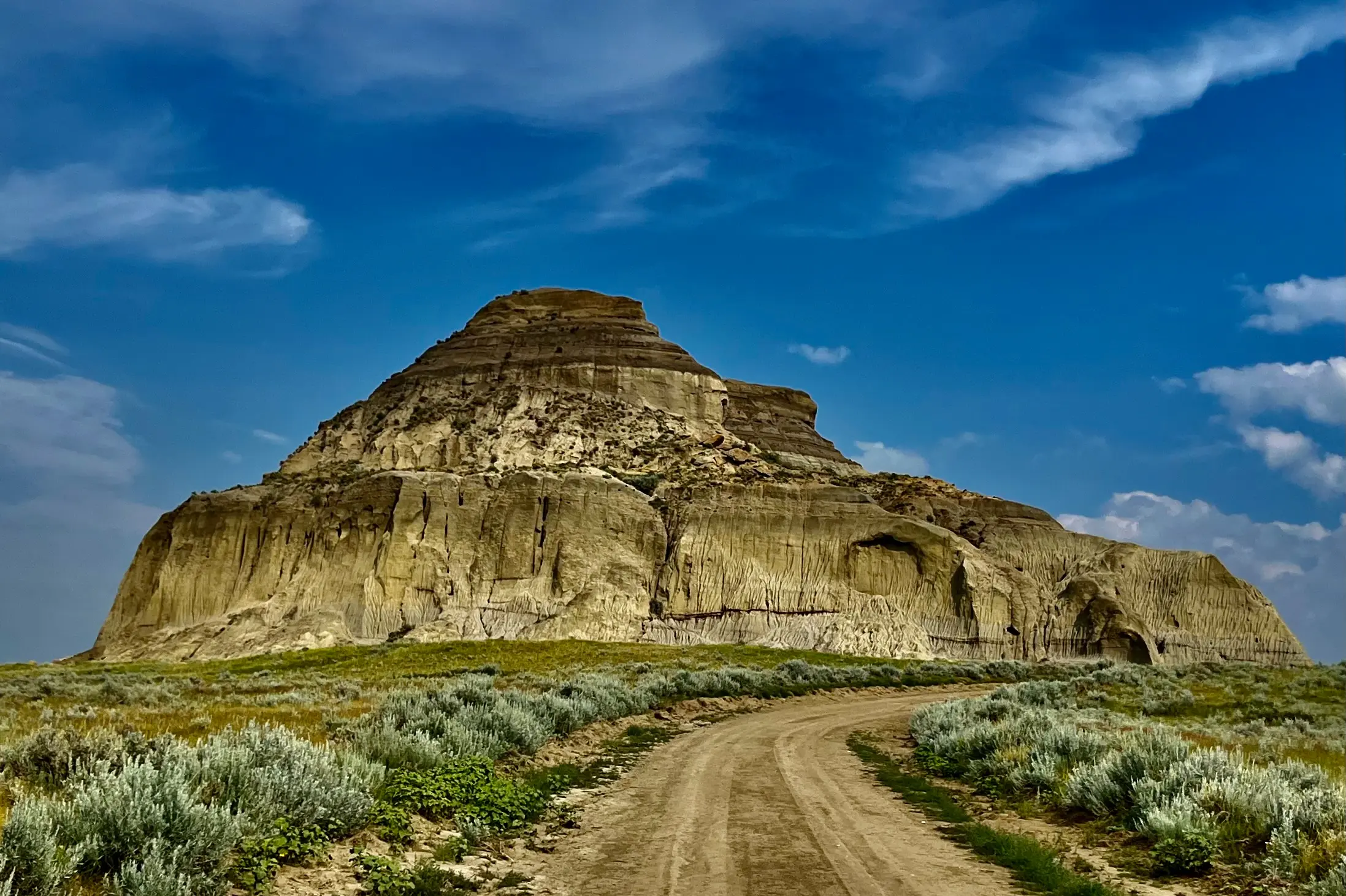 Rolling hills and grassy coulees in the Valley of 1000 Devils, Saskatchewan.